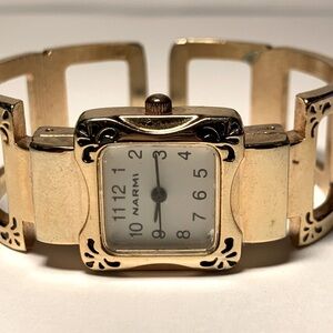 3/$20 Narmi  gold tone women’s bangle watch
